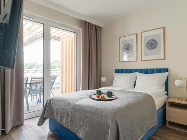 Rezydencja Merwede Aparthotel - My Rest : photo 7 de la chambre appartement 1 chambre avec balcon