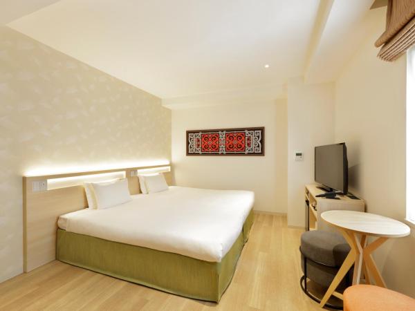 karaksa hotel Sapporo : photo 1 de la chambre chambre lit king-size