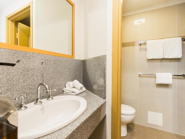 Statesman Hotel : photo 6 de la chambre chambre lit queen-size avec balcon