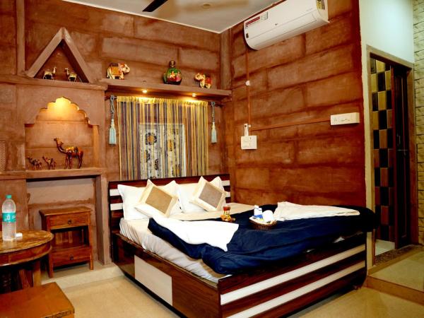 MH Guest House : photo 3 de la chambre chambre lit king-size