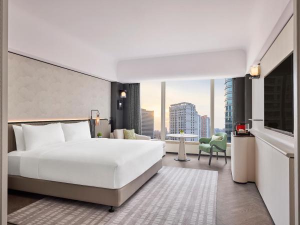Hilton Shanghai City Center : photo 1 de la chambre suite premium lit king-size