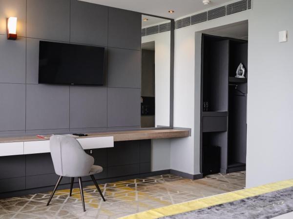 Manhattan Business Hotel, Male : photo 2 de la chambre chambre deluxe (navette aéroport aller-retour gratuite et 10 % de réduction sur la nourriture et les boissons)