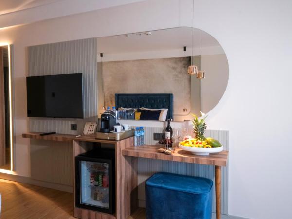 Ada Port Hotel Adults Only : photo 3 de la chambre chambre lit king-size supérieure