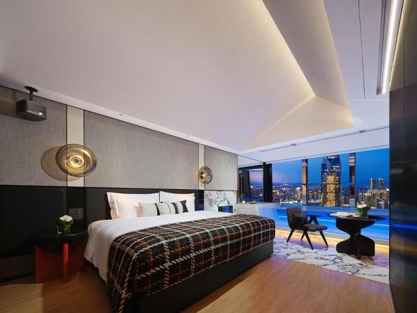 ISEYA HOTEL Chongqing Jiefangbei Flagship : photo 5 de la chambre dawn tower-river view king room - oversized bathtub