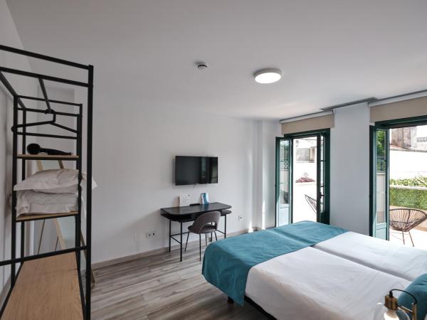 Hotel Pombal Rooms : photo 3 de la chambre chambre lits jumeaux avec terrasse