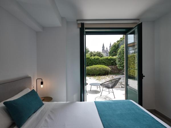 Hotel Pombal Rooms : photo 1 de la chambre chambre double ou lits jumeaux supérieure avec vue sur ville