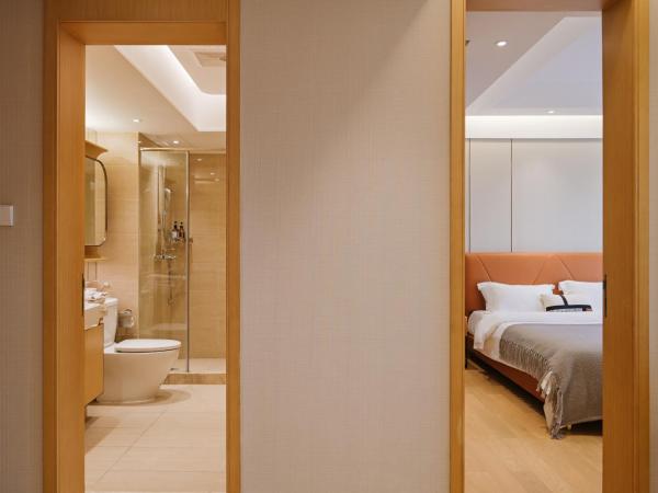 Raffles Executive Apartment - Guangzhou Huijin International Finance Center, Keyun Road Metro Station Branch-Canton Fair Free Shuttle : photo 2 de la chambre suite 2 chambres