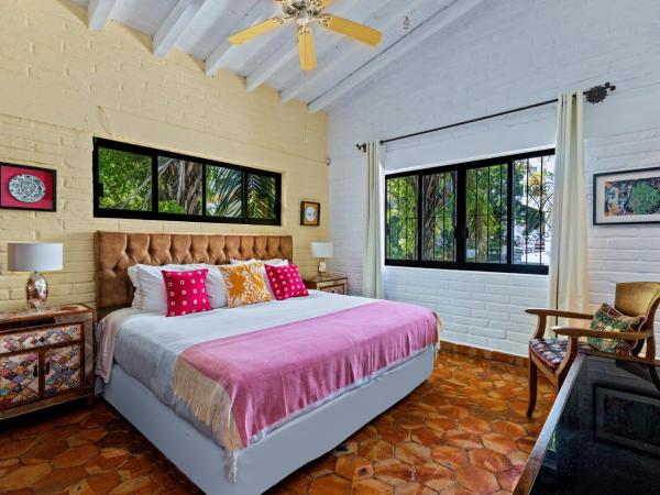 Villa Lola - Adults Only : photo 1 de la chambre chambre lit king-size