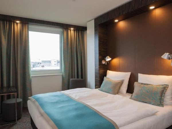 Motel One Leipzig-Augustusplatz : photo 3 de la chambre chambre lit queen-size.