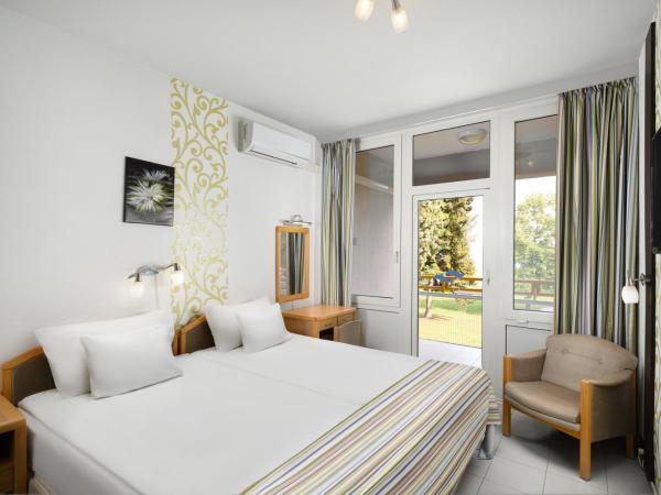 Danubius Hotel Marina : photo 1 de la chambre chambre lit jumeaux exécutive avec vue sur le lac