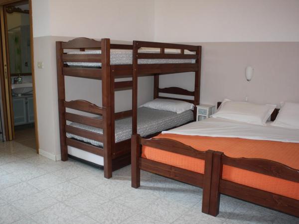 Albergo Avalon : photo 3 de la chambre chambre quadruple