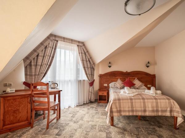 Helan Family & SPA : photo 2 de la chambre chambre double ou lits jumeaux