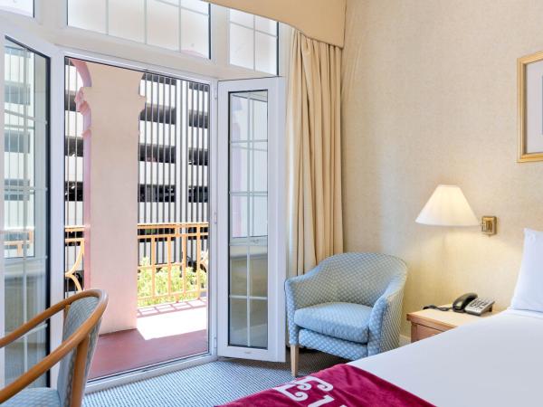 European Hotel : photo 9 de la chambre chambre lit queen-size avec balcon