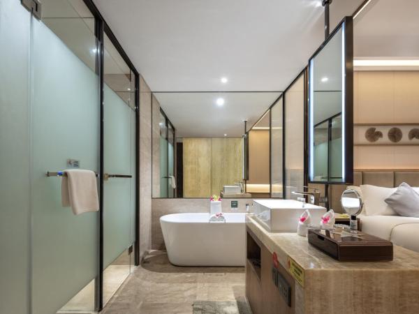 Harman Resort Hotel Sanya : photo 1 de la chambre chambre double ou lits jumeaux supérieure