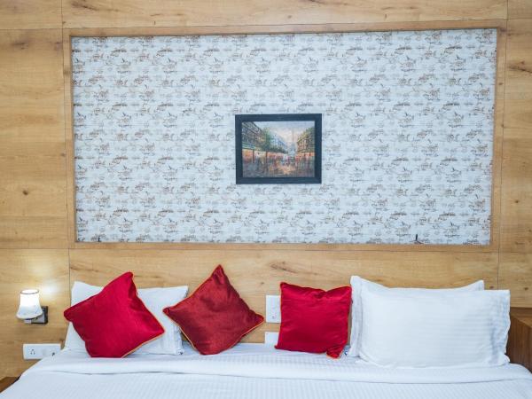 Ishwerya Suites : photo 1 de la chambre suite lit queen-size