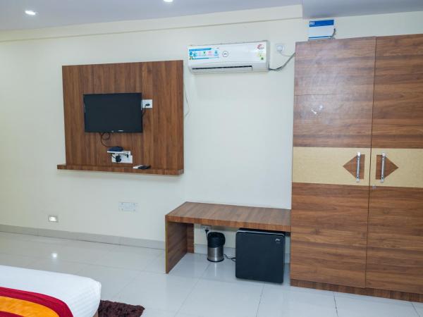 Ishwerya Suites : photo 2 de la chambre chambre lit king-size deluxe