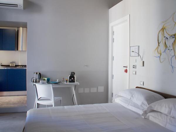 Piazza Castello Suite : photo 2 de la chambre suite deluxe avec balcon