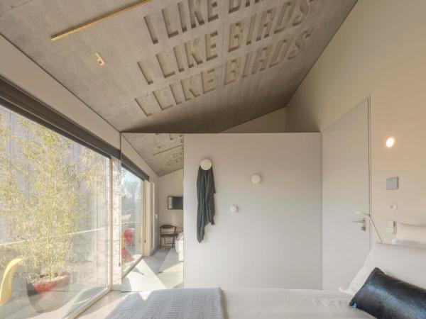 Hotel Tipografia do Conto by Casa do Conto : photo 3 de la chambre chambre double avec balcon - vue sur jardin