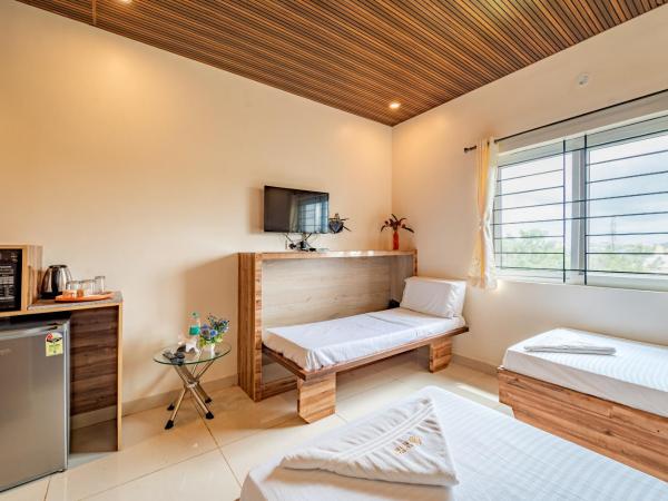 The Suites : photo 3 de la chambre chambre double ou lits jumeaux supérieure avec terrasse