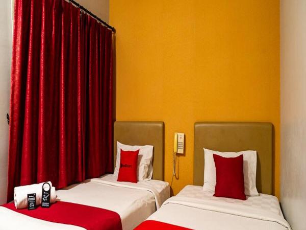 RedDoorz Plus at Blue Pacific Blok M : photo 5 de la chambre chambre lits jumeaux standard