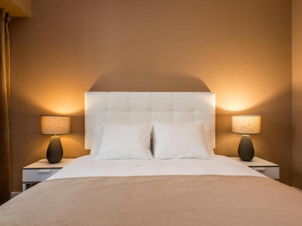 PH Downtown Suites : photo 6 de la chambre suite deluxe avec lit king-size