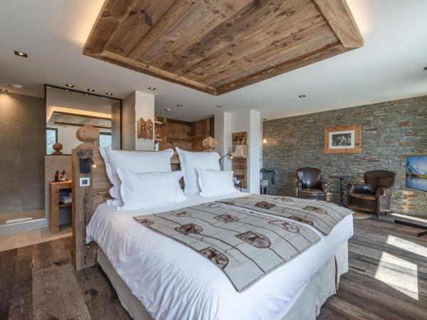 Chalet-Hôtel Hermitage : photo 2 de la chambre suite confortable avec accès au spa