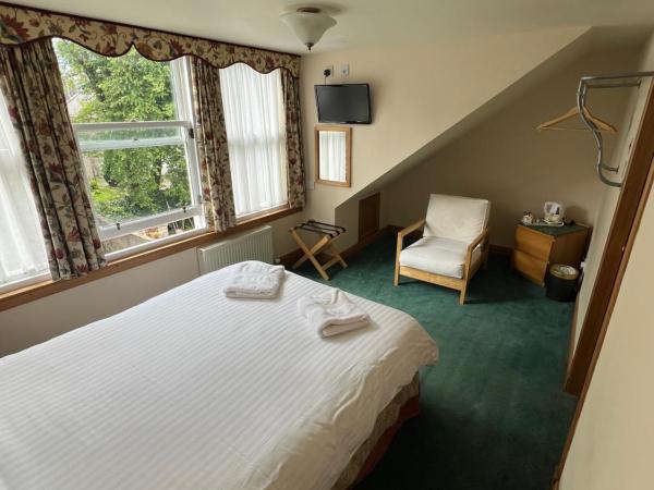 Butlers Guest House : photo 3 de la chambre chambre double avec salle de bains privative