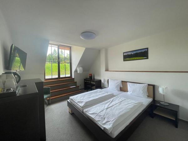 Wellness Hotel Svachovka : photo 1 de la chambre chambre deluxe double ou lits jumeaux