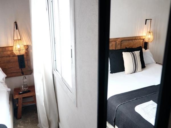 Hostal Boutique Es Menut : photo 3 de la chambre chambre triple