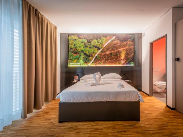 NEW OPENING 2022 - Los Lorentes Hotel Bern City : photo 9 de la chambre chambre lit queen-size avec kitchenette - vue sur cour