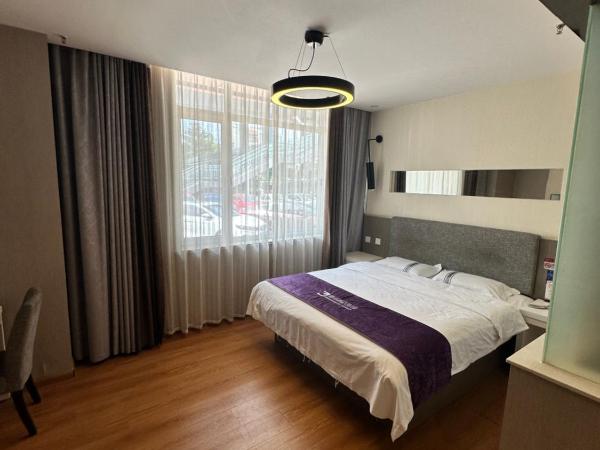 都市118酒店广电大厦店 : photo 2 de la chambre chambre lit queen-size deluxe