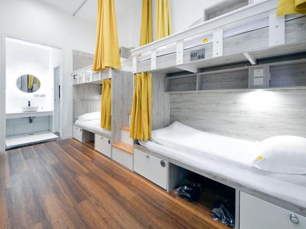 笑脸里青年旅舍宽窄店 : photo 1 de la chambre lit dans dortoir pour femmes de 6 lits