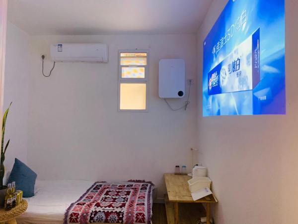 笑脸里青年旅舍宽窄店 : photo 4 de la chambre chambre double