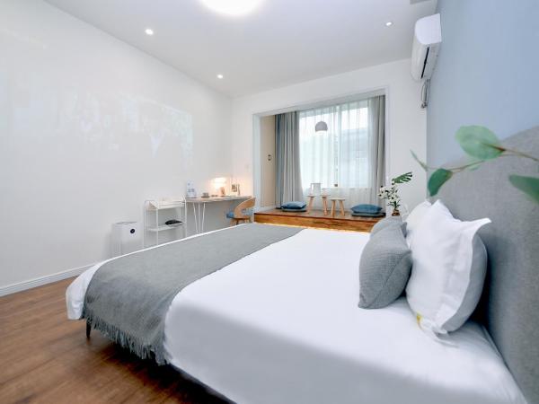 笑脸里青年旅舍宽窄店 : photo 2 de la chambre chambre double deluxe