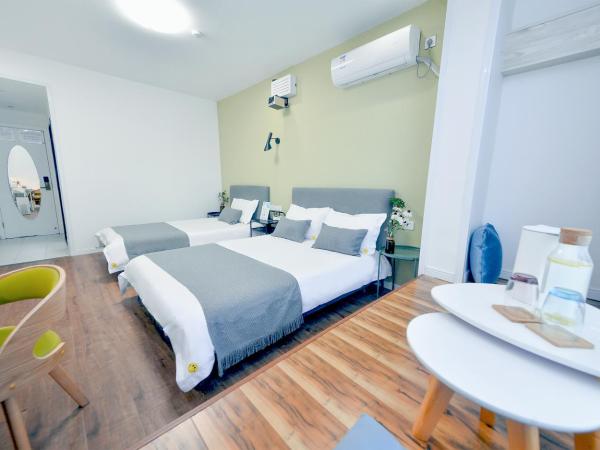 笑脸里青年旅舍宽窄店 : photo 4 de la chambre chambre lits jumeaux