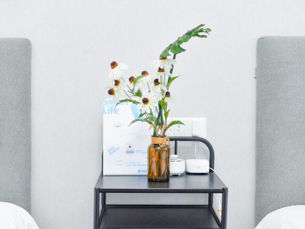 笑脸里青年旅舍宽窄店 : photo 9 de la chambre chambre lits jumeaux