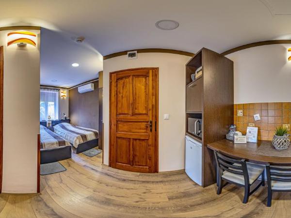 Napraforgó Wellness Ház és Panzió : photo 10 de la chambre appartement 2 chambres