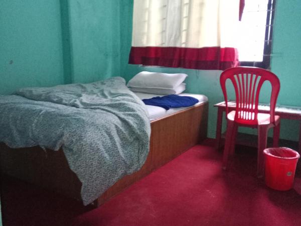 Myagdi Devisthan Guest House And Bhanchha Ghar : photo 3 de la chambre chambre simple