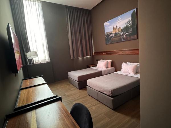 AMAE21 Lofts : photo 9 de la chambre chambre lits jumeaux deluxe