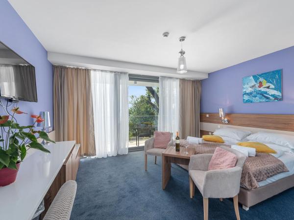 Boutique Hotel Mali Raj : photo 1 de la chambre chambre double ou lits jumeaux deluxe - vue sur mer