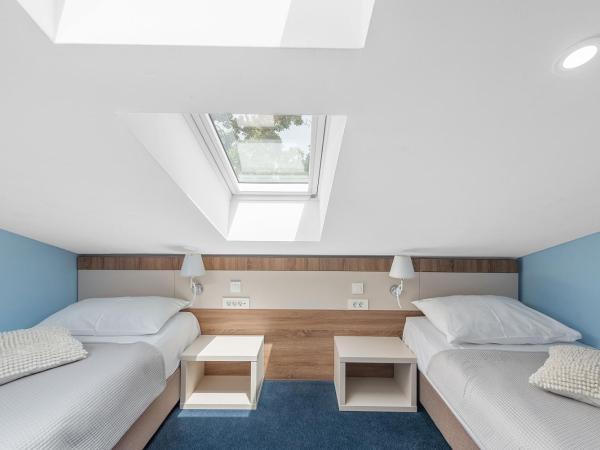 Boutique Hotel Mali Raj : photo 3 de la chambre suite 2 chambres - mansardée