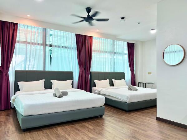 New Margo Hotel KK : photo 8 de la chambre chambre familiale