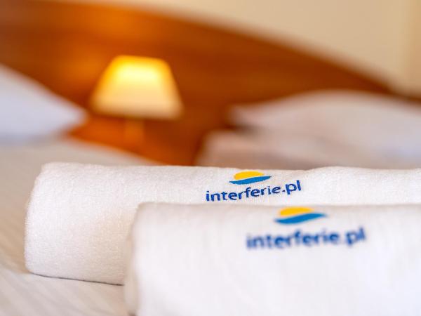 Interferie Chalkozyn w Kołobrzegu : photo 4 de la chambre chambre triple standard