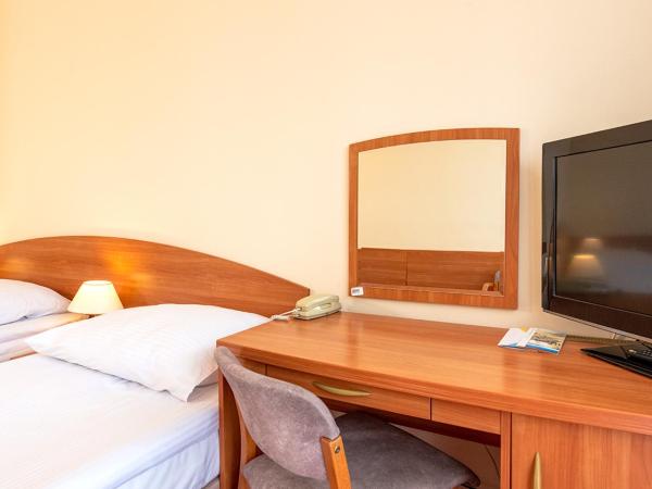 Interferie Chalkozyn w Kołobrzegu : photo 2 de la chambre chambre lits jumeaux