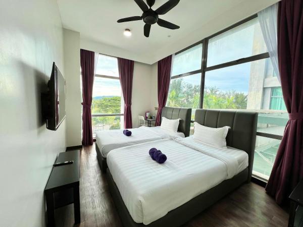 New Margo Hotel KK : photo 1 de la chambre chambre lits jumeaux standard