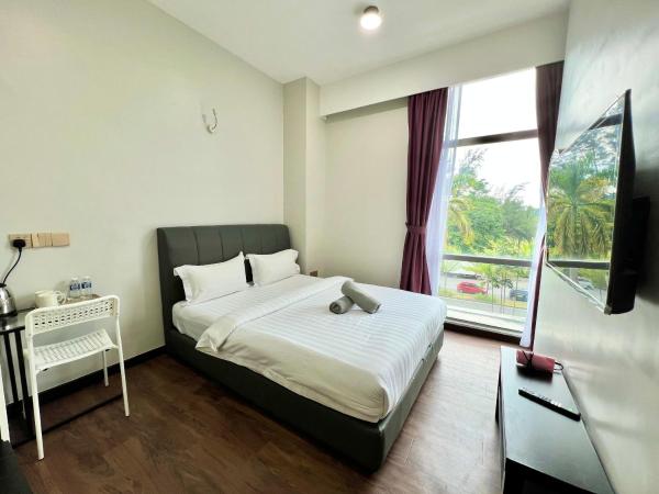 New Margo Hotel KK : photo 9 de la chambre chambre lit queen-size