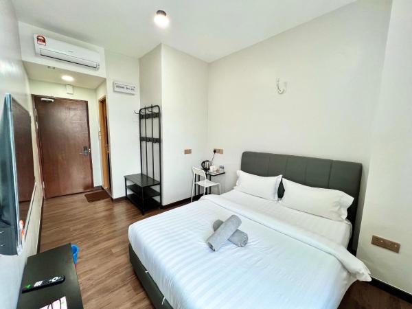 New Margo Hotel KK : photo 10 de la chambre chambre lit queen-size - vue sur jardin