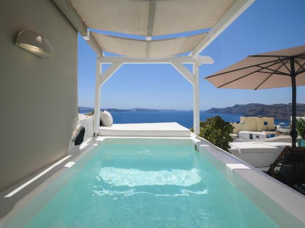 Sophia Oia View : photo 1 de la chambre sophoia - suite troglodyte avec petite piscine extérieure - vue sur caldeira
