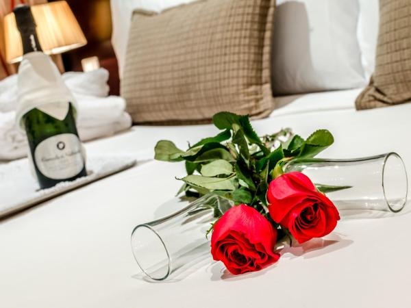 Exe Suites 33 : photo 4 de la chambre hébergement escapade romantique