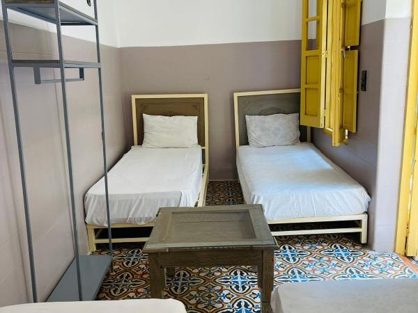 The Madrassa Hostel : photo 2 de la chambre chambre quadruple Économique avec salle de bains commune